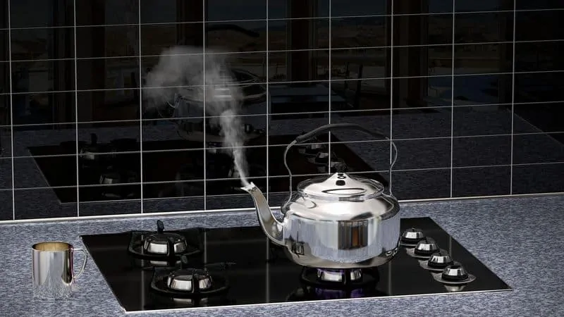 whistling tea kettle on stove