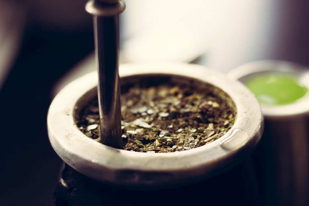 yerba mate leaves brewing in gourd