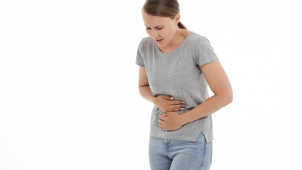 Woman with intestinal cramps