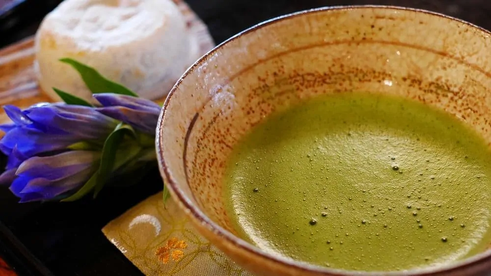 Cup of matcha with food