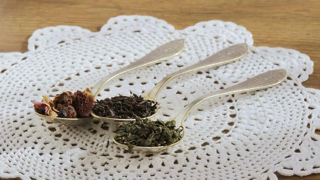 Tea leaves on spoons