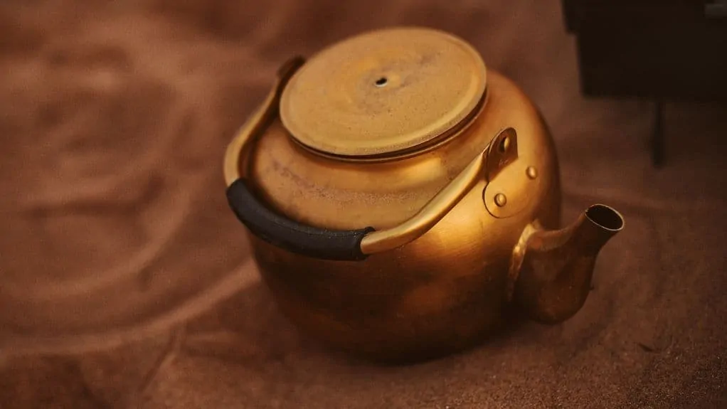 A copper colored tea kettle