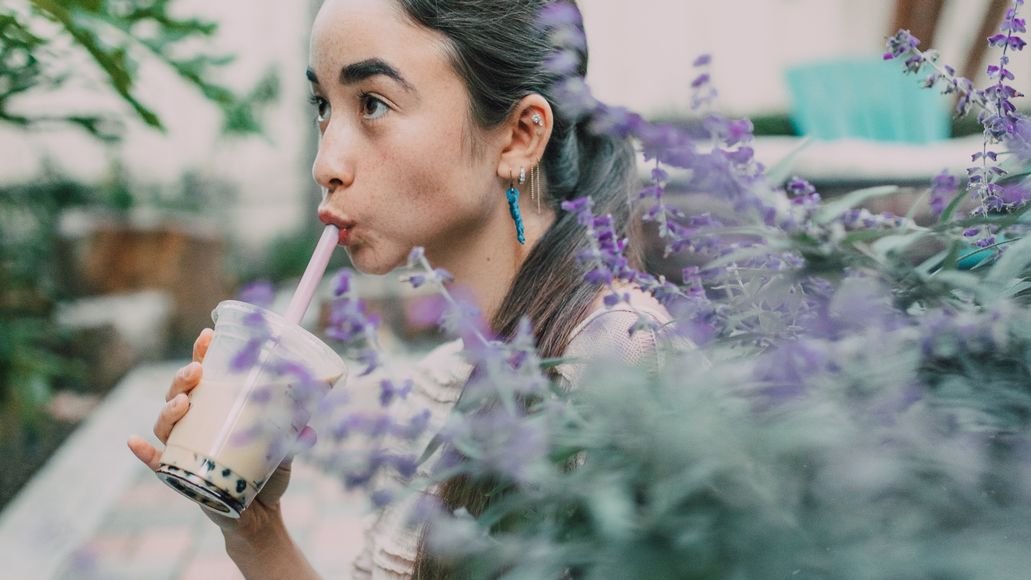 Woman drinking boba tea