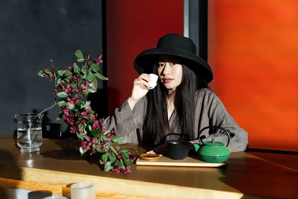 japanese woman enjoying green tea flavor