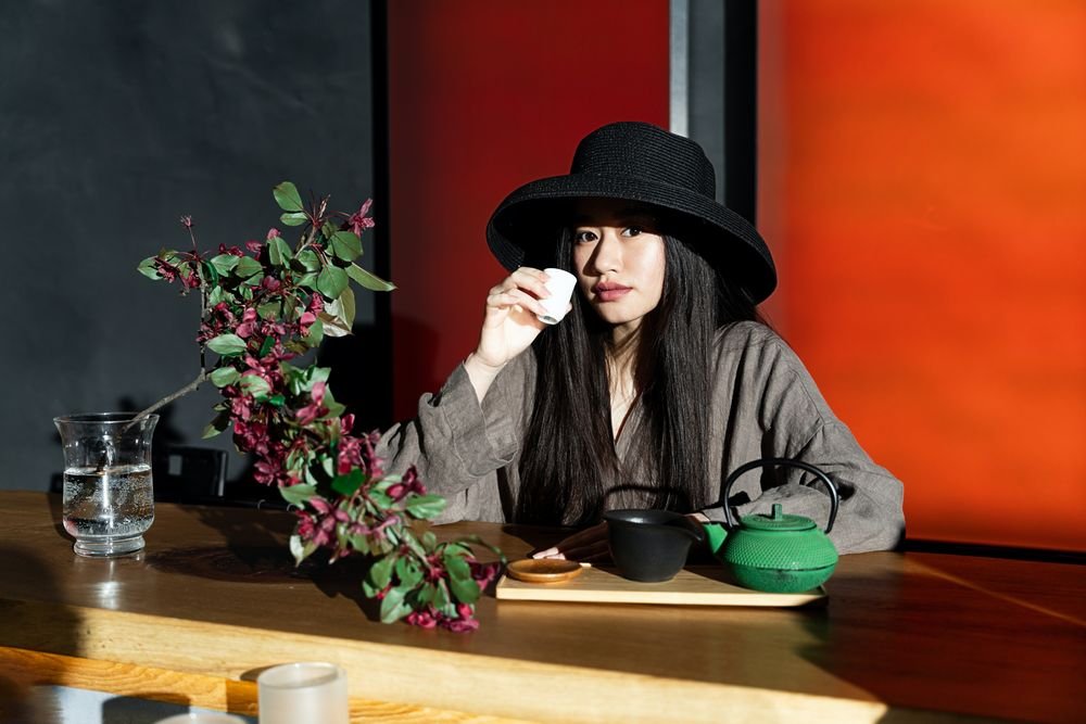 japanese woman enjoying green tea taste