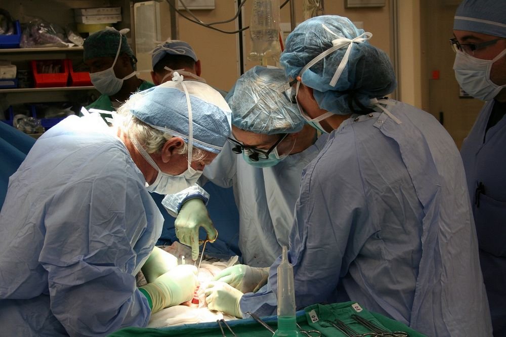 doctors performing surgery